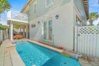 This home's living space has plenty of natural light and doors that open up to the front patio.
| Emerald Palm by Boutiq Luxury Vacation Rentals | Miramar Beach, Florida
