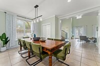 Welcome to Emerald Palm's downstairs primary bedroom. Equipped with luxury king bedding this room opens up to the backyard pool patio. The exquisite designs and furnishings bring the room together.
| Emerald Palm by Boutiq Luxury Vacation Rentals | Mirama