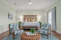 Fully furnished with chairs and a sitting bench. This bedroom also includes luxury king sheets and the private primary bath.
| Emerald Palm by Boutiq Luxury Vacation Rentals | Miramar Beach, Florida