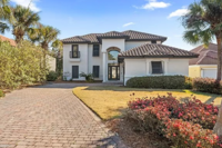 Upon entering the guests will immediately be in the foyer with stairs leading to the upstairs bedroom. a hall that leads to the garage and laundry rooms on the right, and a hall that leads to the living and dining room in front of them. 
| White Sands by 