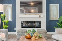 Spacious living room with huge smart TV, fireplace, and lots of natural light.
| White Sands by Boutiq Luxury Vacation Rentals | Destin, Florida
