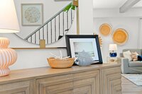 To the right of the entryway is a hallway that will lead to the garage, the half bath, and the laundry room.
| White Sands by Boutiq Luxury Vacation Rentals | Destin, Florida To the right of the entryway is a hallway that will lead to the garage, the half bath, and the laundry room.
| White Sands by Boutiq Luxury Vacation Rentals | Destin, Florida