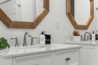 The downstairs ensuite bathroom also features a large walk in shower, perfect for washing off after a long day at the beach. 
| White Sands by Boutiq Luxury Vacation Rentals | Destin, Florida