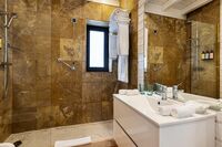 two bedroom cottage bathroom at the magnolia hotel_wide