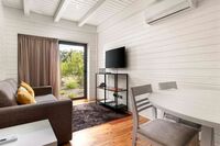 two bedroom cottage living room at the magnolia hotel_wide