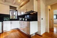 two bedroom cottage kitchen at the magnolia hotel_wide