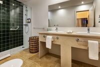 suite bathroom at the magnolia hotel_wide (1)