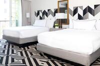 cwh_premtwoqueensuitebalc_beds 611d00f4ebc52